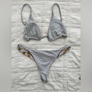 Billabong floral and polka dot reversible thong bikini set